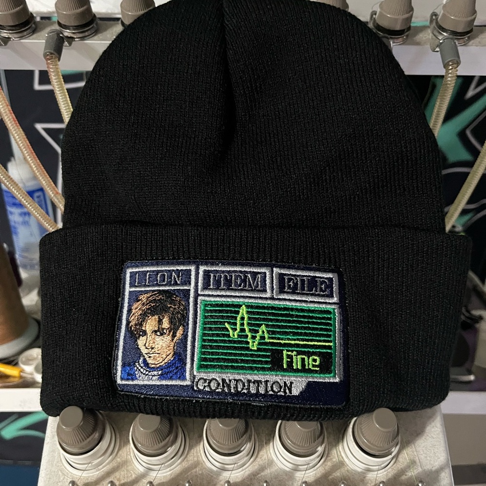 Black Beanie with Embroidered 'Leon' Patch